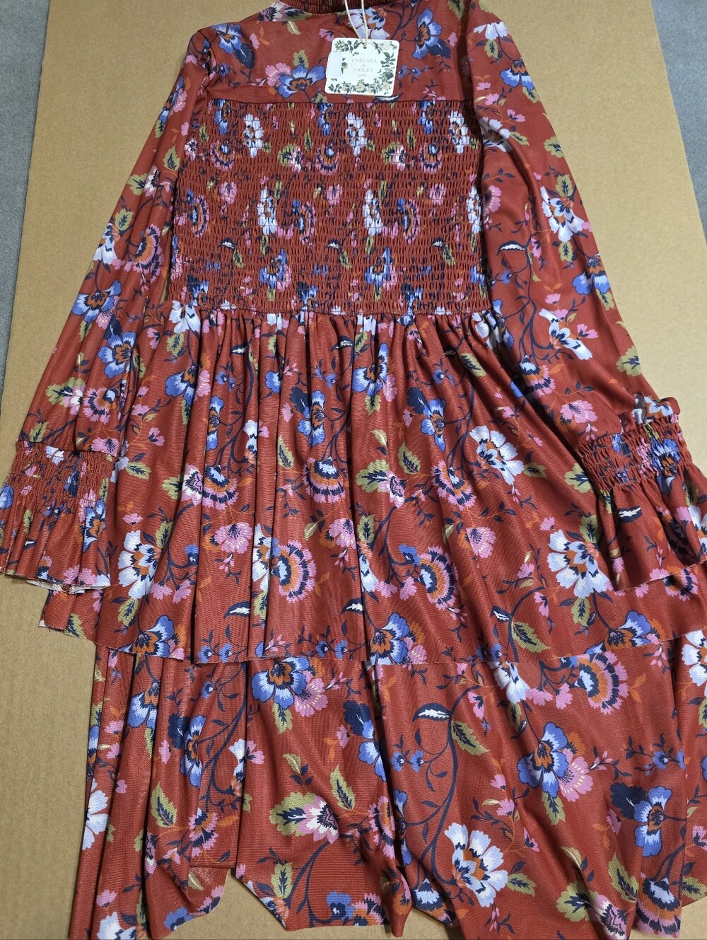 Chelsea & Violet Girls Rust Floral Smocked Dress with Blue and Pink Blooms
